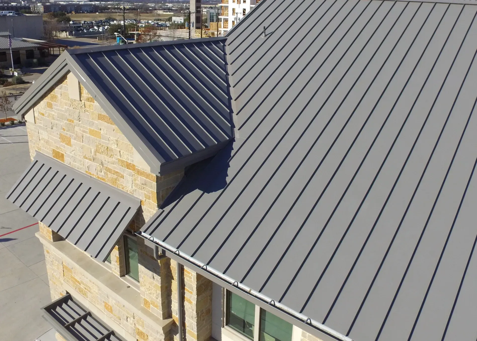Close-up of standing seam metal roof installed by JC Roofing